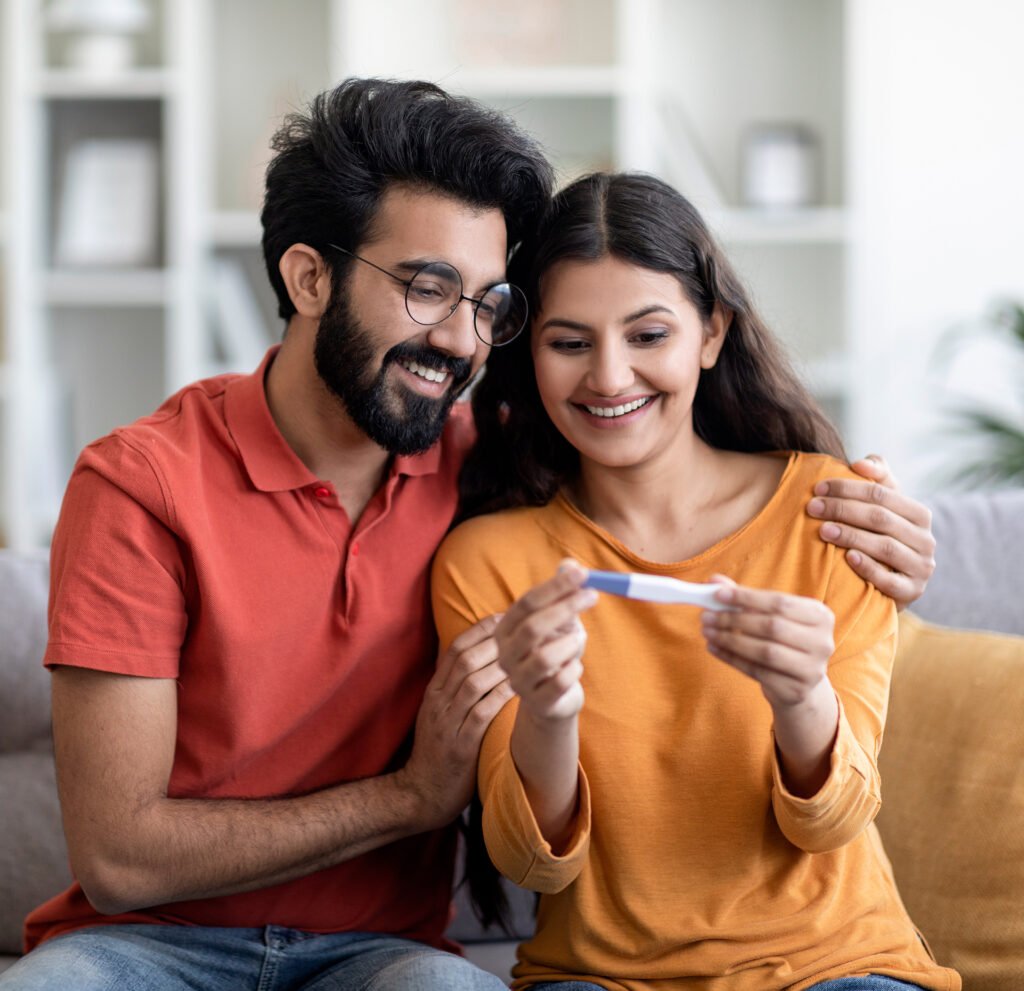 Portrait of happy young indian couple holding posi 2023 05 04 00 28 46 utc