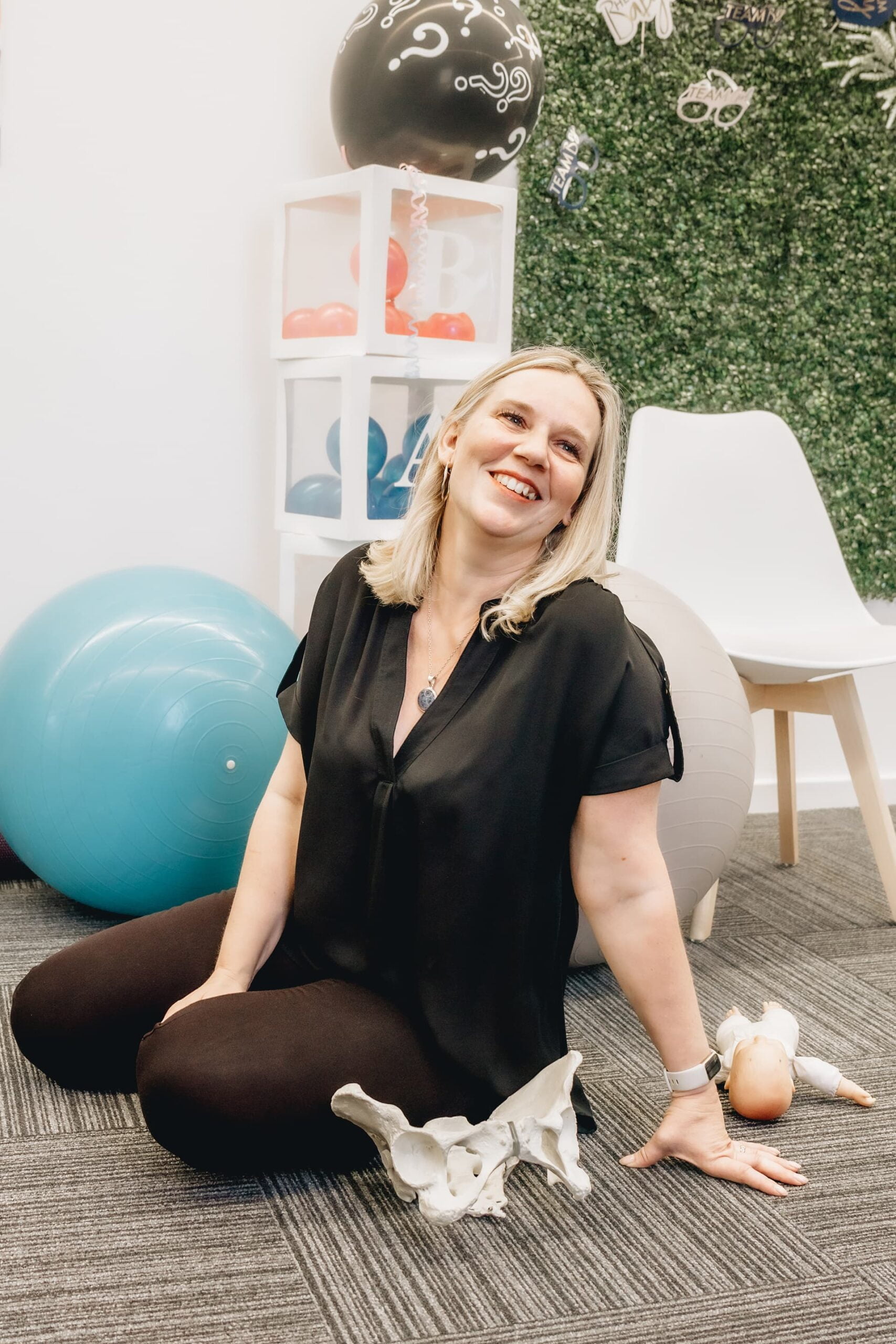 Photo of a smiling Tracy Sealey teaching one of her antenatal classes